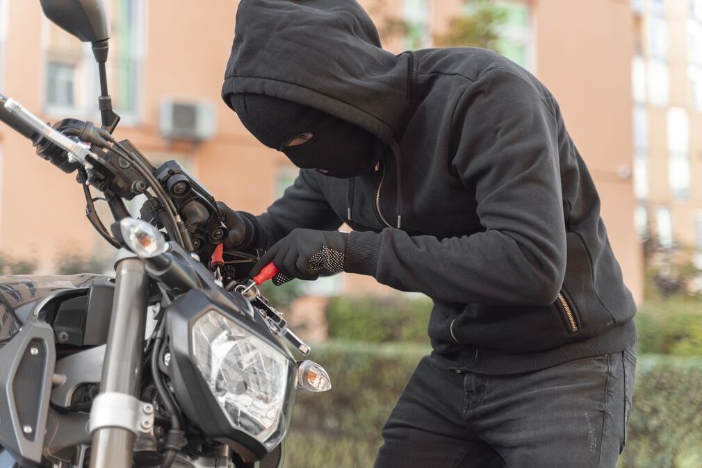 close-up-man-preparing-steal-motorcycle_optimized_200